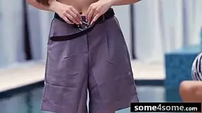 Hot teens engage in poolside interracial blowjob group