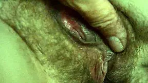 Spreading Wet Hairy Vagina In Low Light