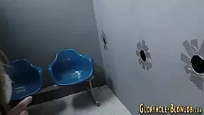 teen sucks black shlong at gloryhole and swallows cum.