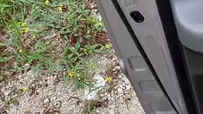 Petite young woman films herself outdoors in pov style