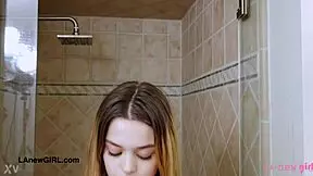 young blonde teen enjoys relaxing bath during photoshoot casting