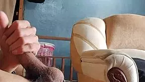 Masturbating my cock hard in the living room - damn hot!