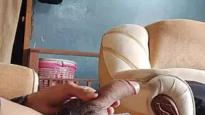 Masturbating my cock hard in the living room - damn hot!