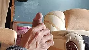 Masturbating my cock hard in the living room - damn hot!