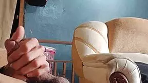 Masturbating my cock hard in the living room - damn hot!