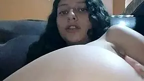 Latina enjoys solo masturbation on furniture almost caught