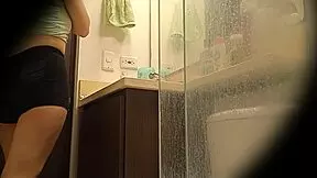 Hidden cam catches professor Milet with big tits and ass in upskirt pissing