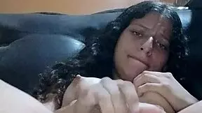 Latina enjoys solo masturbation on furniture almost caught