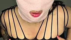 Hey, watch this naughty masked babe pound her pussy hard!