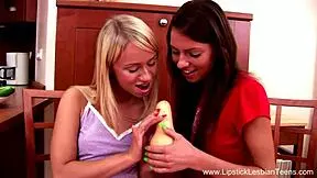 Teen Lesbians Play With Toys In The Kitchen After Undressing