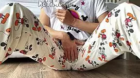 Skinny teen in pajamas masturbates to squirting orgasm