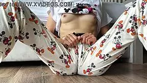 Skinny teen in pajamas masturbates to squirting orgasm