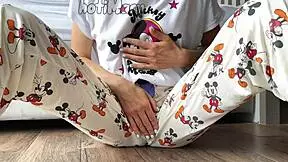 Skinny teen in pajamas masturbates to squirting orgasm