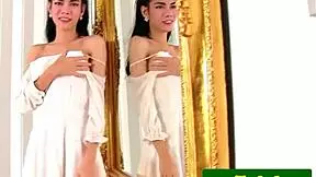 busty ladyboy mia teases while stroking in mirror