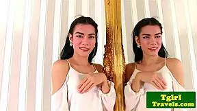 busty ladyboy mia teases while stroking in mirror