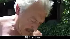 Damn, this dirty blonde slut is rimming grandpa's ass like crazy!