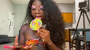 So, Lola Black was just chilling, licking a lollipop live with her sexy ebony vibe.