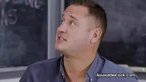 Asian spinner rides teacher's cock by the chalkboard