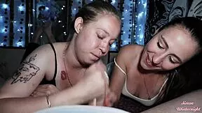 young wife and friend give sloppy blowjob in bed