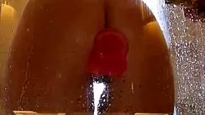 Girl with big ass enjoys shower fun with pink dildo?