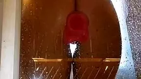 Girl with big ass enjoys shower fun with pink dildo?