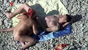 Busty cougar milf gets fucked doggystyle on beach by young guy!