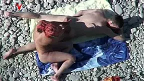 Busty cougar milf gets fucked doggystyle on beach by young guy!