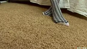 Maid in shorts plays with buttplug and ass.