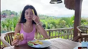 cute girl eating burger with cum on face during public cafe cumwalk