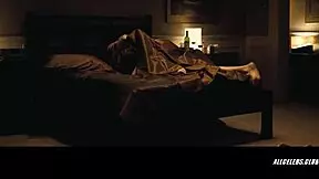 Flora Montgomery flashes her small 18+ tits in a sexy topless scene. This celebrity milf gives a steamy handjob in Basic Instinct.