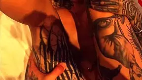 Tayna Crispim collaborates on a tattoo session with the studio owner