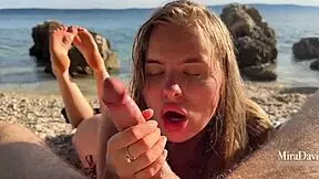 Beach couple fucks doggystyle with blowjob