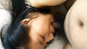 Asian young 18+ girl assisting with my sock in a casual setting