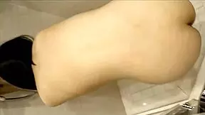 Asian young 18+ girl assisting with my sock in a casual setting