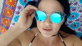 Latina licks big clit on beach relaxation day