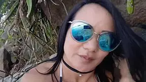 Latina licks big clit on beach relaxation day