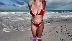 Hot girl with big tits begs for a naughty favor on the beach