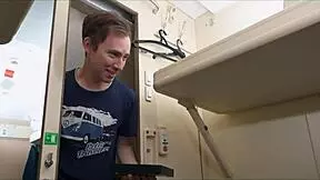 In the train, a young redhead performs anal for a stranger's attention