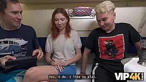 In the train, a young redhead performs anal for a stranger's attention