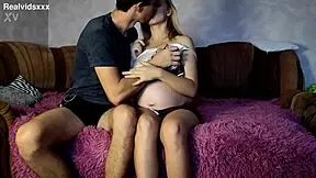 9th month pregnant blonde teen 18+ sucks and rides bf on couch