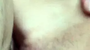 a mature blonde with tattoo shows off her feet and ass in amateur video