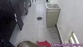 Teen's tits get jizzed in public bathroom blowjob.