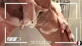 ugly face chick fingers herself in foamy bathtub