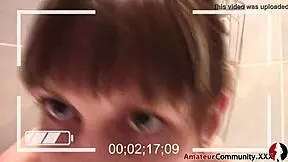 ugly face chick fingers herself in foamy bathtub