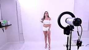 hot brunette begs photographer for cum on sofa during pov massage