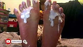 This 18-year-old Latina gets feet creamed on webcam.