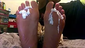 This 18-year-old Latina gets feet creamed on webcam.