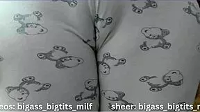 In her pajamas, this mature Latina milf rubs herself solo. Her big tits and wet curves tell a steamy story.