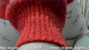 In her pajamas, this mature Latina milf rubs herself solo. Her big tits and wet curves tell a steamy story.