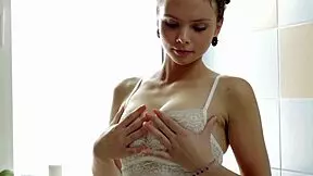 Hot Russian babe dildoing underwater in steamy bath scene